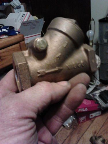 bronze check valve, 1 inch, Nibco, inline, 45 degree plug access, plastic seat.