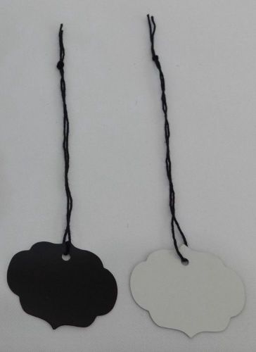 Lot 100 ornate oval black dots print 1 1/4 x 1 5/8 merchandise price tags strung for sale