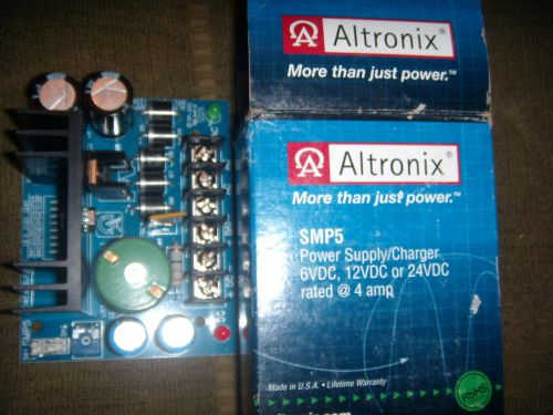 TWO Brand New Altronix SMP5 Proprietary Power Supply, converts a low voltage AC