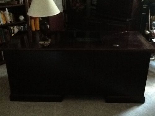 Executive solid mahogany desk with hidden computer screen under glass center for sale
