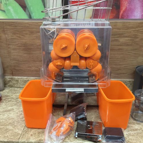 Electric commercial auto feed orange lemon squeezer juicer machine 22-25 0/mins for sale
