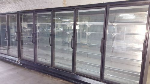 Hussmann glass door reach in freezer or  commercial cooler display case for sale