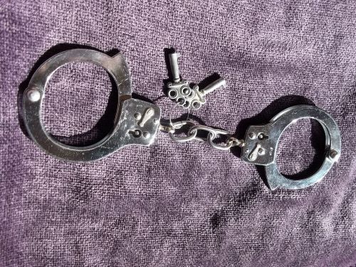 Halloween Costume Accessory.  Real Handcuffs.  Two keys.
