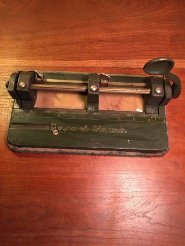 Vintage green improved hummer cast iron industrial paper 3 hole punch for sale