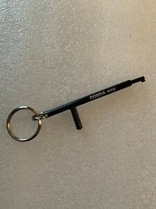 UNIVERSAL HANDCUFF KEY POLICE BATON KEY CHAIN FITS MOST HANDCUFFS