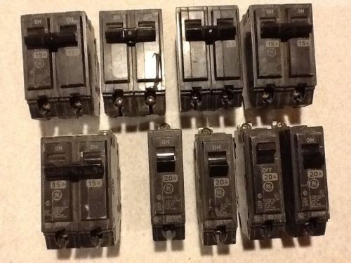 Ge thqb mixed lot of 9 circuit breaker 5-2pole 15 amp 4-single pole 20 amp bolt for sale