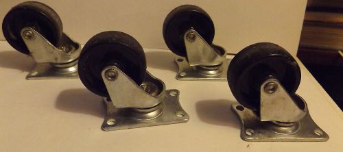 Set of 4 Vintage Casters 2&#034; Hard Black Plastic Wheels &amp; 4 hole Mounting Plates