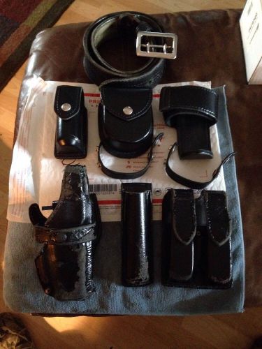 Completely set up Duty belt with Safariland/Glock holster and more!!!!! Size 34