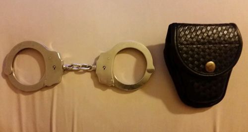 Peerless model 500 handcuffs and accumold elite handcuff case for sale