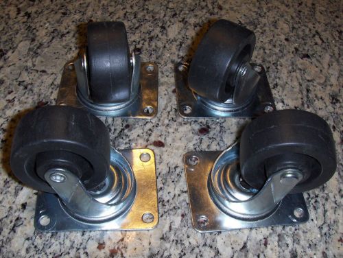 Four new 2 3/4&#034; swivel caster wheels 4 hole 3 1/8&#034; x 4 1/16&#034; plate 360 degrees for sale