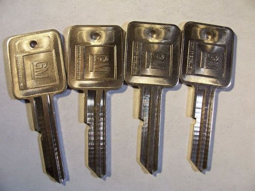 4  OEM  A  GM  KEY BLANK  WITH KNOCKOUT IN PLASE  UNCUT   ORIGINAL