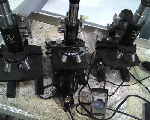 three monocular microscopes