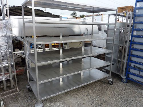 Heavy duty stainless steel rack with 6 shelf’s on swivel casters for sale