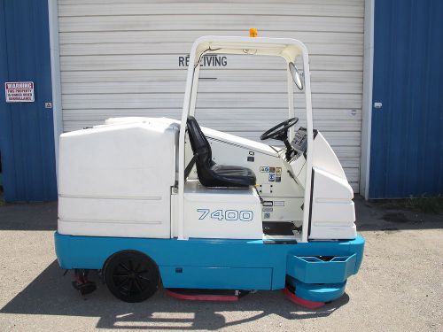 Tennant 7400lp ride on floor scrubber propane for sale