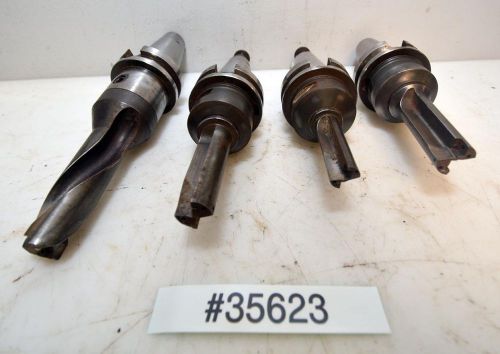 1 Lot of 4 BT40 Tool Holders with 2 Flute Insert Cutters (Inv.35623)