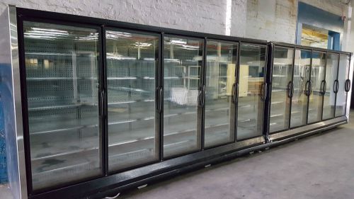 Hussmann glass door reach in freezer or cooler display case / 15 doors for sale