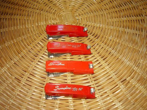 Four vintage red Swingline Tot-50 Mini Staplers