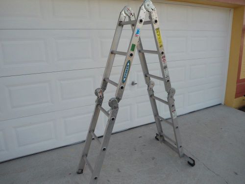 Werner master ladder type 1a-extra heavy duty 300 lb /turns into a scaffold for sale