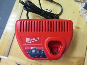 MILWAUKEE M12 BATTERY CHARGER MODEL # 48-59-2401 USED WORKING