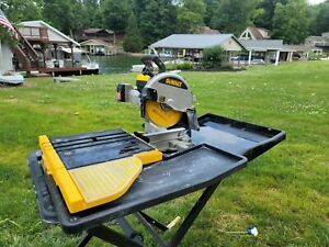 DEWALT D24000 Wet Tile Saw plus Dewalt D24001 stand approx 40 hours of use 