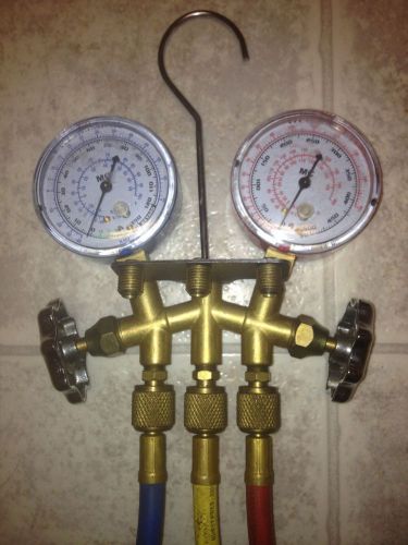 Mastercool brand ,brass gauges, r-12,r-22,r-502,w/36&#034; colored hoses for sale