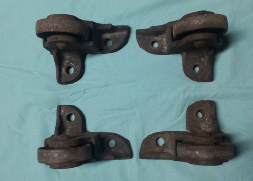Four large antique cast iron floor safe casters wheels from an old cary safe for sale