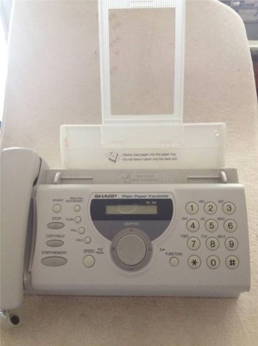 Sharp uxp115 phone/fax/copier w bonus new thermal transfer ribbon hardly used for sale