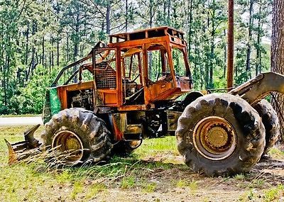 Burned Timberjack 460 Log Skidder