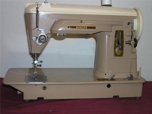 Heavy duty singer 404 sewing machine w/attachments for sale