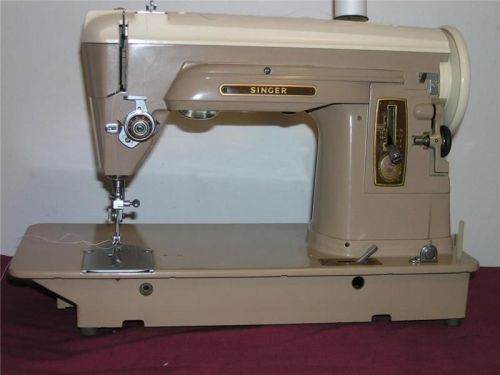 HEAVY DUTY SINGER 404 SEWING MACHINE w/attachments