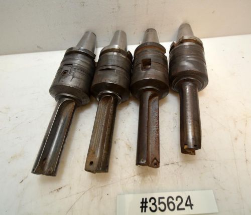 1 Lot of 4 BT40 Tool Holders with 2 Flute Insert Cutters (Inv.35624)