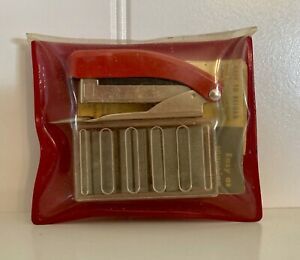 Vintage Model T-230 Buddy Jr. Stapler, original pouch, staples, and instructions