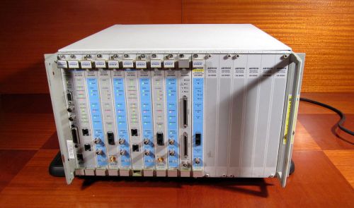 Adtech spirent netcom ax 4000 broadband test system with 11 modules for sale