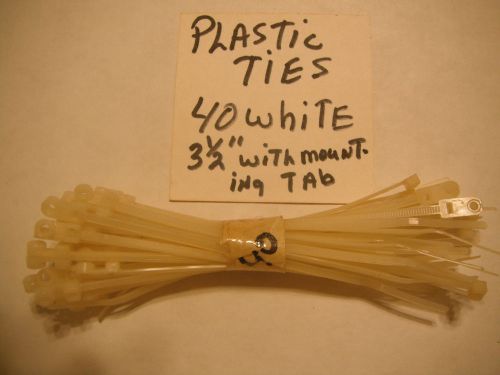 40 white plastic ties 3 1/2&#034; long with  mounting tab.