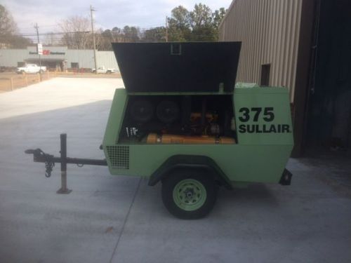 2001 sullair 375 mobile air compressor. ga power owned. 3809 hours. cat diesel for sale
