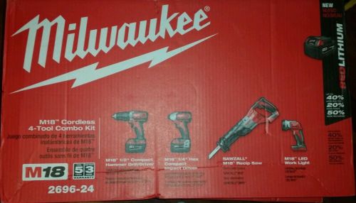 Brand new!! milwaukee m18 cordless 4 tool comvo kit, model# 2696-24 for sale