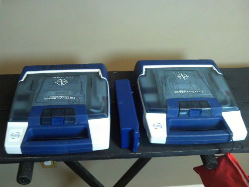 Lot of (2) firstsave cardiac science powerheart aed g3 with pads model 9300c-001 for sale
