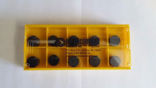1,700 newcomer ceramic button inserts (rngn45t7xsn65) w/ 4 hog mill cutter bodys for sale