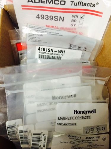 Lot of (63) New Honeywell Security/Fire Devices, SIMs, Contacts, Motions, Smk,CO