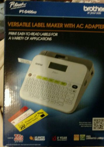 Versatile label maker with AC adapter