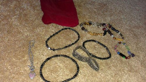 Jewelry Lot in Red Bag 8 Bracelets 3 Magnetic 3 with Charms 2 Misc