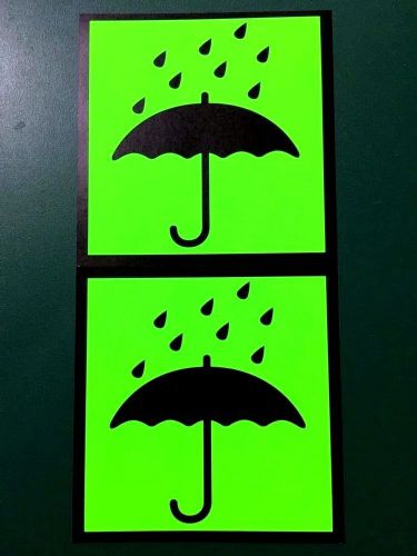 2 fluorescent sticker labels wet floor raining umbrella sign caution 105x107mm for sale