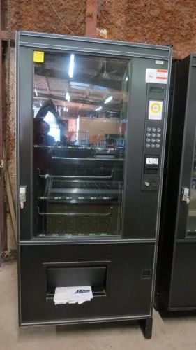AMS 35 VCF vending machine  combo set up for sodas and snacks, refrigerated.