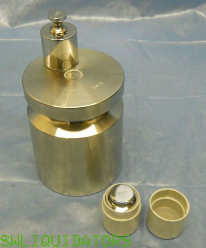 Three piece  calibration weights 100g 200g and 5Kg