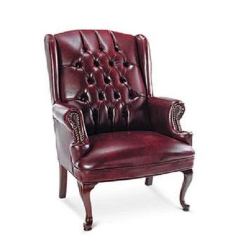 Traditional series wing-back arm chair, mahogany finish/oxblood vinyl for sale