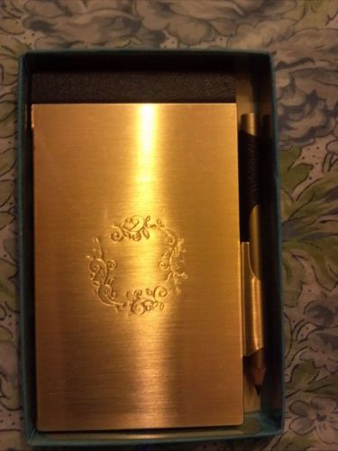 Gold flip open pocket notepad with retractable pencil for sale