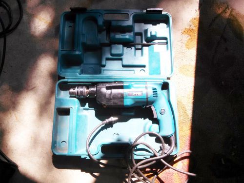Makita hp2030 hammer drill / works with case for sale