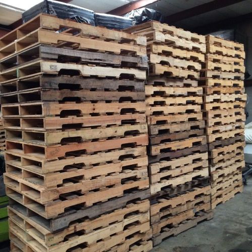 100 Wooden Pallets.