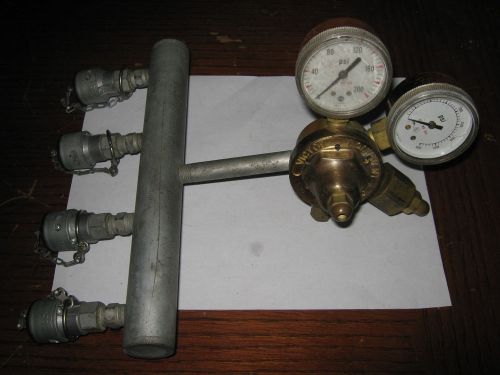 1 pc 4 port oxygen manifold with victor equipment co. oxygen regulator, used for sale