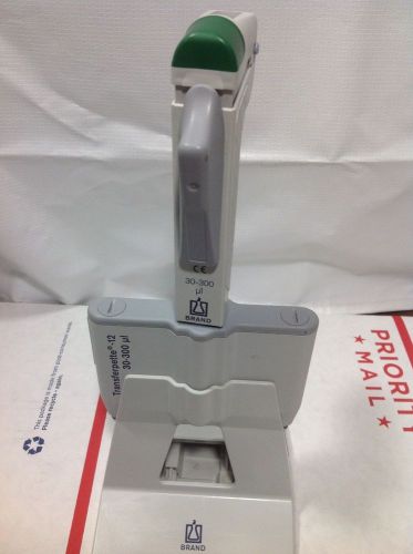BrandTech Transferpette 12 Channel Manual Pipette, 30-300 uL #1 with stand